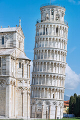 The Leaning Tower of Pisa  is a medieval structure, famous for the settling of its foundations, which caused it to lean 5.5 degrees The bell tower was built in 1173 in white marble, Italy, 2019