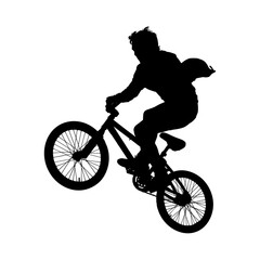 Fototapeta premium silhouette of a man riding a bike