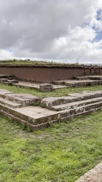 TIWANAKU, BOLIVIA - Pumapunku or Puma Punku, Gate of the Puma man-made terraced platform mound the ruins of the monumental complex