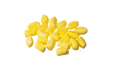 Famous traditional Turkish yellow Mevlana candy (in Turkish: Mevlana Şekeri ) isolated on a white background. The local confectionery product in Konya, Turkiye. Close up shot