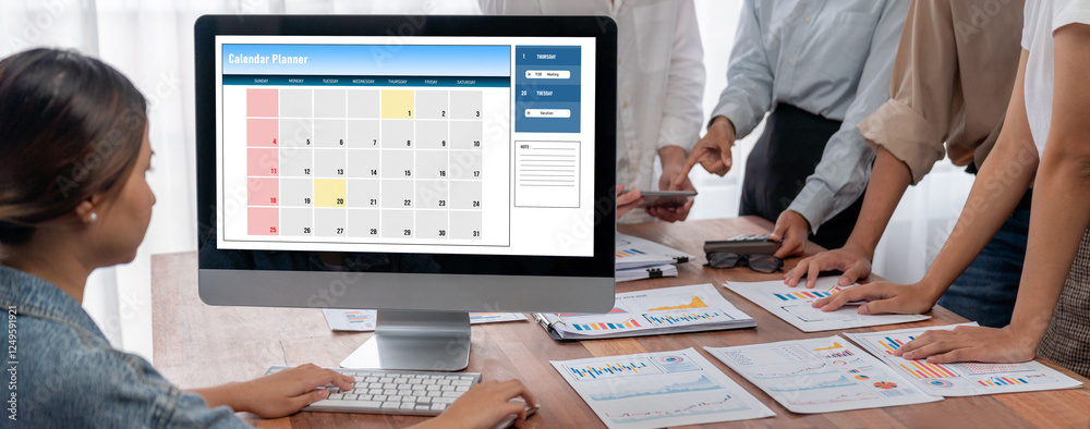 Poster calendar on computer software application for brisk schedule planning for personal organizer and onl