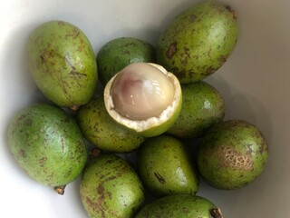 A plate of Matoa, the sweet and juicy original fruits from Papua-Indonesia.