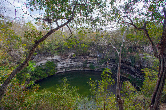 Sacred cenote at the archeological site Chichen Itza, Mexico