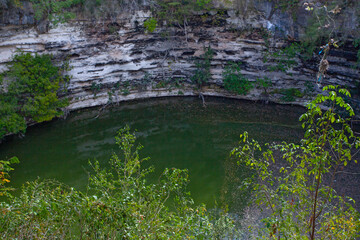 Sacred cenote at the archeological site Chichen Itza, Mexico