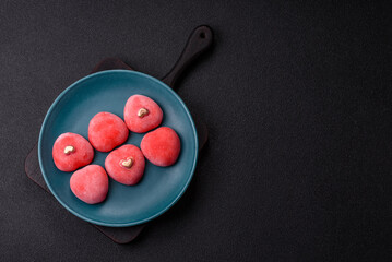 Delicious sweet mochi in the shape of red hearts