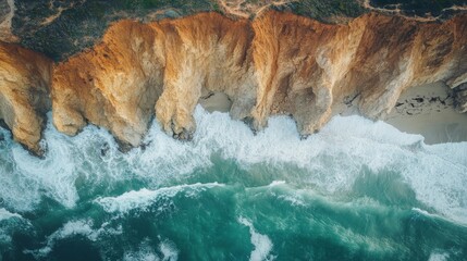 A dramatic shot of coastal cliffs eroding as waves crash against the shore, with the land visibly crumbling into the ocean