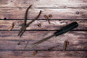 Rusty Tools on Wooden Surface
