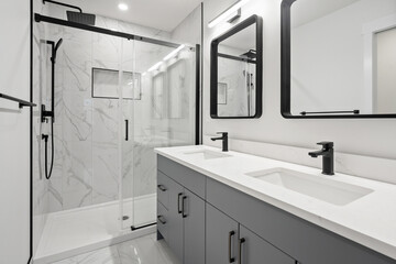 Bathroom with a shower and two sinks