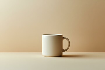White ceramic coffee mug on beige background with soft shadows and minimalist composition, suitable for product photography and lifestyle marketing.
