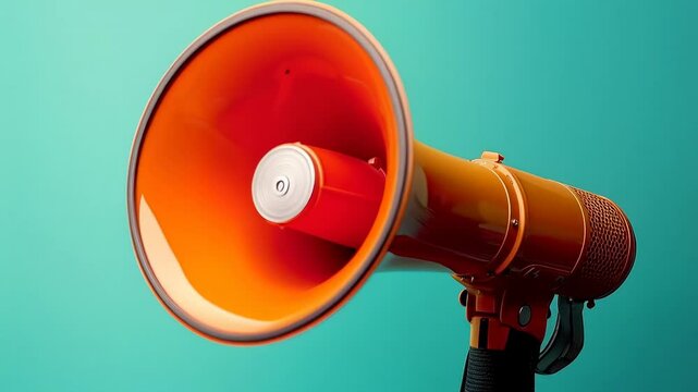 A Vibrant Orange Megaphone for Effective Communication Outdoors