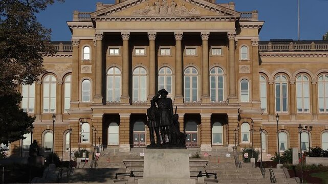 Iowa State Capitol, in Des Moines. The Iowa State Capitol houses the Senate, House of Representatives, the Offices of the Governor, Attorney General, Auditor, Treasurer, and Secretary of State