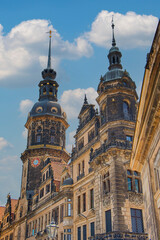Fototapeta premium Dresden, Germany. Hausmannsturm tower and Dresden Cathedral Catholic Court Church.