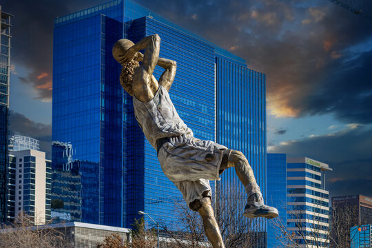 A statue of the basketball player Dirk Nowitzki in PNC Plaza at American Airlines Arena in Dallas Texas USA