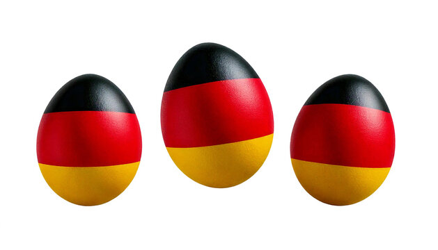 Ostereier in den Farben der deutschen Flagge, stilvoll bemalt in Schwarz, Rot und Gold, symbolisieren nationale Verbundenheit und kreative Osterdekoration