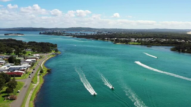 Lake Macquarie Swansea channel marine boat traffic in Australia &ndash; aerial view 4k.
