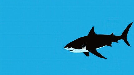 Fototapeta premium Silhouette of a shark swimming against a glowing blue ocean backdrop
