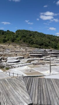 Inland salt pans of Anana, their threshing floors full of salty water evaporating in the sun, salt production in inland salt mines in the Anana Salt Valley, Alava, Spain