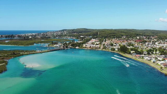 Marine boat traffic on Swansea channel in Australia from Lake Macquarie to Pacific ocean.
