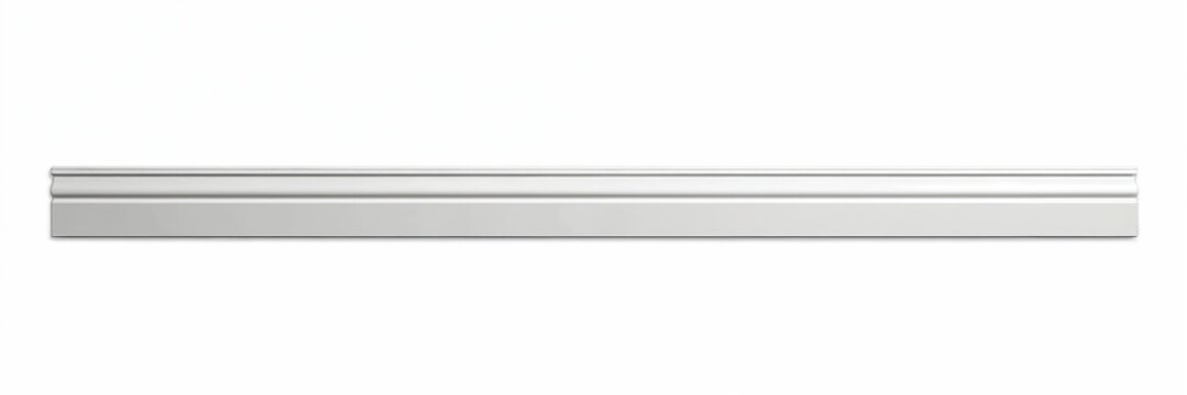 White baseboard plinth with decorative profile. Long horizontal element isolated on white background. Suitable for interior design projects. Useful as decorative trim. Modern home design element.