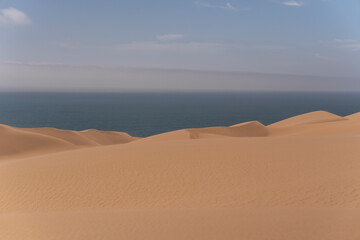 A breathtaking contrast—golden sands and deep blue waters