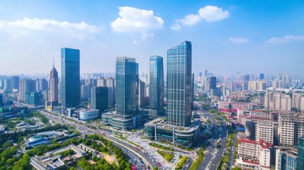 Naklejka premium Modern Cityscape: Aerial View of Skyscrapers and Urban Landscape Under Blue Sky
