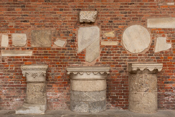 Historic artefacts in the entrance portico of the Basilica of Sant' Ambrogio, Milan