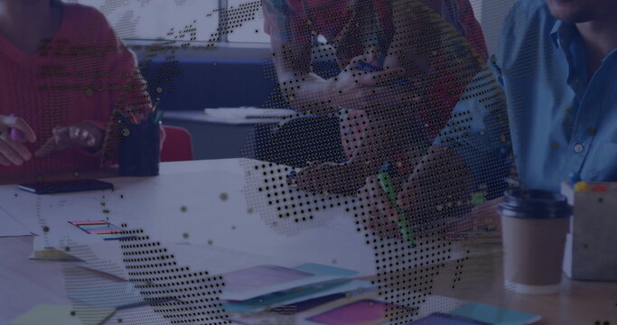 Collaborating on project, team brainstorming ideas with digital overlay at office desk - Powered by Adobe