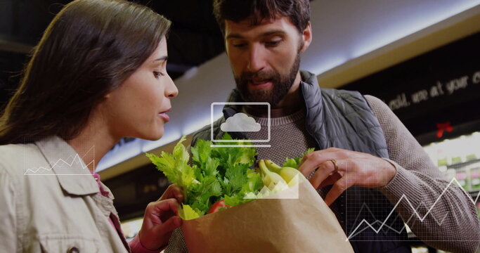 Charts and graphs image over couple grocery shopping and examining produce - Powered by Adobe