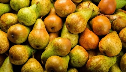 Fresh pears arranged in a vibrant display at a local market during harvest season
