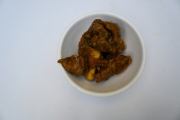 Indian Goat mutton curry in traditional style. Mutton Curry are delicious Indian mutton dishes. spicy mutton curry in Indian home. Delicious Goat meat. 
