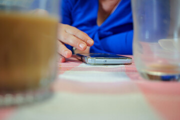 watching the news on a smartphone