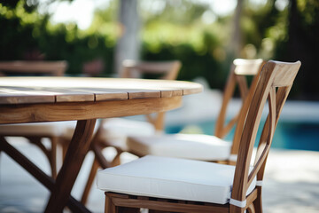 Poolside dining area with modern wooden furniture