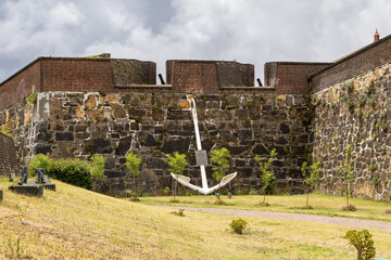 Photo of an large anchor on a wall outside the Castle of Good Hope in Capetown South Africa