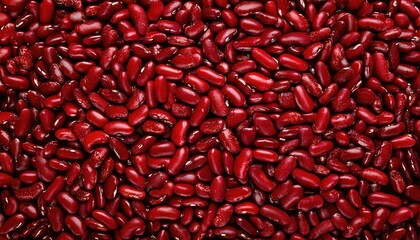 Red kidney beans scattered across a surface showcasing their rich color and texture
