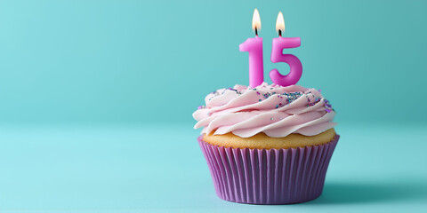 Cupcake to celebrate 15th birthday or anniversary, with pink frosting. blue background