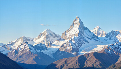 Naklejka premium Snow-capped mountains against a clear blue sky