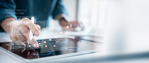 Finance analyst working on business analytics and data management system to make financial report with business performance, KPI dashboard. Corporate strategy for finance, business analysis