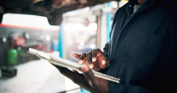 Car, engine and tablet with hands in repair shop for mechanic maintenance, diagnostic technician or workshop. Motor inspection, pressure sensor and performance calibration with person in garage