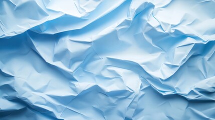 Obraz premium Abstract light blue crumpled paper texture background.