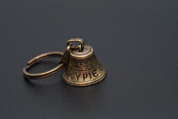 A bronze bell on which it is written in Greek: Kyrie eleison (or Kurie eleison, in ancient Greek),...