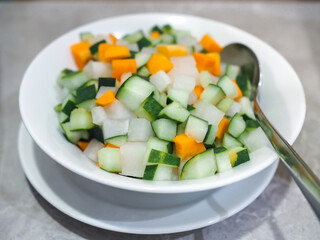 Pickles are a type of food that is preserved using vinegar and salt water.