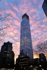 Obraz premium Stunning High Rise Building Reflecting Sunset Under Colorful Sky : Generative AI