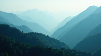Naklejka premium Serene vista of layered mountains, a tranquil landscape bathed in soft blue hues, showcasing the beauty of nature's artistry in a breathtaking panorama.
