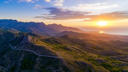 Fototapeta premium Stunning Aerial View of Majestic Mountains at Sunset Overlooking the Ocean : Generative AI