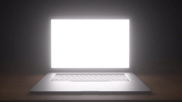 Computer screen glows bright white light. Camera moves inside the computer screen into the light.
