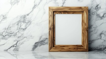 Elegant wooden picture frame leaning against a white wall on a marble surface, spacious copy space.