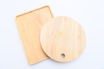 brown wooden tray and sphere cuttingboard isolated on white background