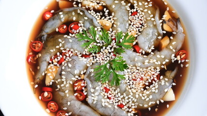 shrimp in soy sauce on white plate, korean style menu