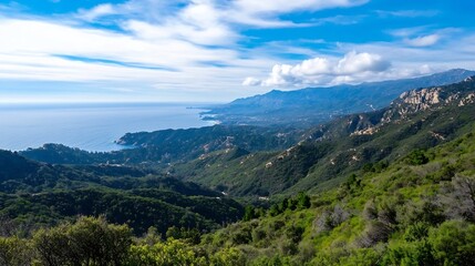 Fototapeta premium Scenic Coastal View of Mountains and Ocean Under Clear Blue Sky with White Clouds : Generative AI