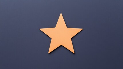 Obraz premium A vibrant orange star shape centered on a dark blue background, symbolizing creativity and achievement